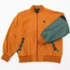 Shop Melinoë Model Hades II Blouson Orange Bomber Jacket Front View