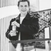 Shop Tom Holland Aston Martin Black Satin Workwear Varsity Jacket front view