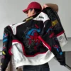 Spider-Man FW26 Black and White Cotton Varsity Jacket with full-length sleeves and two outside pockets