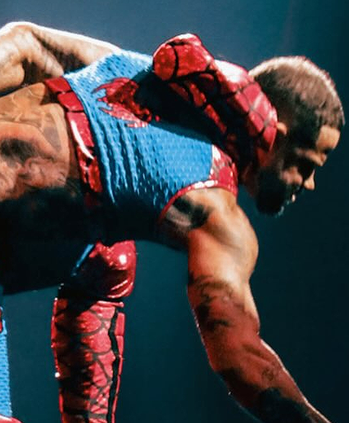 TNA-Lockdown-2026-Trey-Miguel-Red-and-Blue-Spider-Man-Hooded-Vest-Back-Closeup