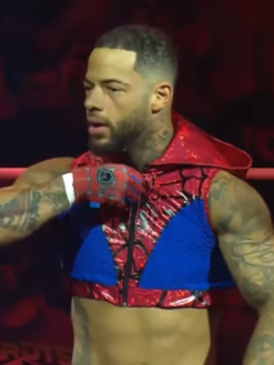 TNA-Lockdown-2026-Trey-Miguel-Red-and-Blue-Spider-Man-Hooded-Vest-Closeup