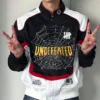 Undefeated x Spider-Man FW26 Varsity Jacket featuring erect collar, rib-knit cuffs, and snap-tab closure