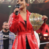 WWE-NXT-2026-TNA-Knockouts-Champion-Kelani-Jordan-Red-Leather-Adidas-3-Stripes-Hooded-Coat-Front