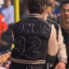 2026-Pro-Football-Halftime-Show-Nick-Jonas-Black-and-Off-White-Varsity-Jacket