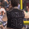 2026-Pro-Football-Halftime-Show-Nick-Jonas-Black-and-Off-White-Varsity-Jacket-Back