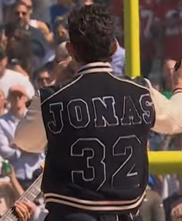 2026-Pro-Football-Halftime-Show-Nick-Jonas-Black-and-Off-White-Varsity-Jacket-Back