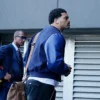 Clos-up of Caleb Williams American Football Team Chicago Bears Tunnel Black Wool Leather Varsity Jacket