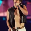 Close-up of 2026 Las Vegas iHeartRadio Music Festival Benson Boone Black Leather Vest