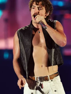 Close-up of 2026 Las Vegas iHeartRadio Music Festival Benson Boone Black Leather Vest