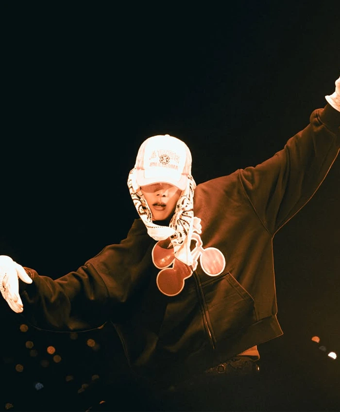 Close-up of BTS J-Hope AWGE A$AP Rocky FW26 SS26 Black Fleece Hooded Jacket
