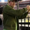 Close-up of Brad Pitt NASCAR Cup Series Chase Bass Pro Shops 2026 Tennessee Green Suede Bomber Jacket