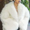 Close-up of Cardi B Gucci Spring Show Milan Fashion Week 2027 White Faux Fur Trench Coat