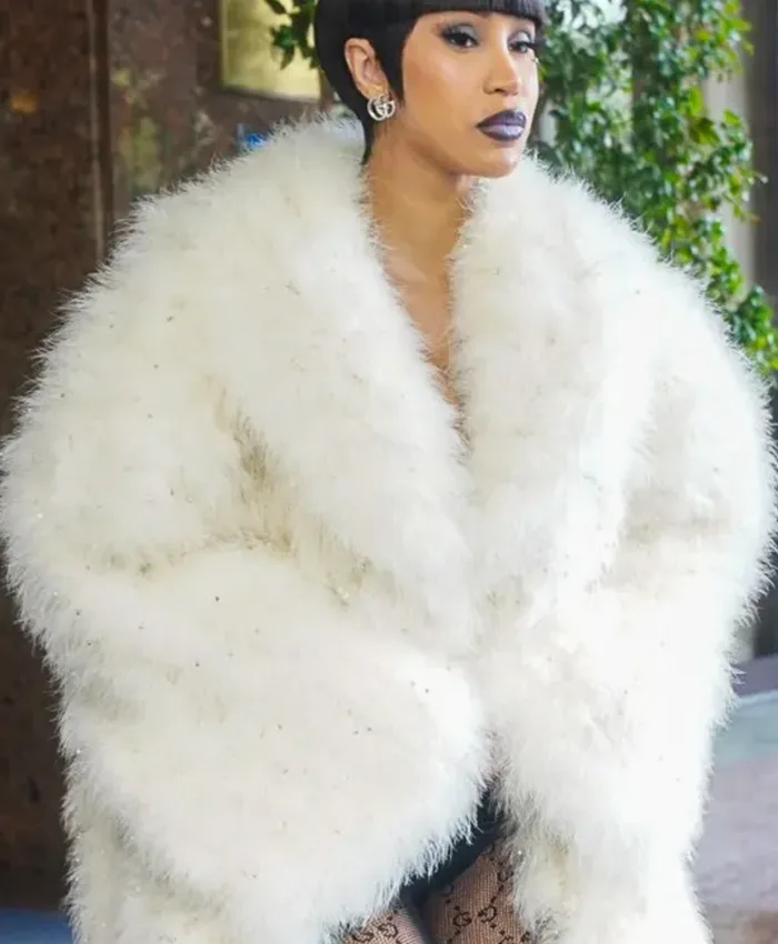 Close-up of Cardi B Gucci Spring Show Milan Fashion Week 2027 White Faux Fur Trench Coat