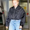 Close-up of Florence Pugh New York Airport Black Cropped Polyester Prada Bomber Jacket