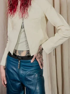 Close-up of Kai Cenat VIVET Debut New York Fashion Week 2026 Cream Zip-Up Moto Cafe Racer Leather Jacket