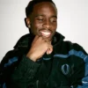 Close-up of Kai Cenat VIVET Debut New York Fashion Week 2026 Fleece Black And Blue Track Jacket