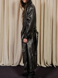 Close-up of Kai Cenat VIVET Debut New York Fashion Week 2026 Oversized Black Leather Trench Coat