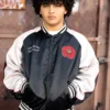Close-up of MC Abdul It Goes To Eleven Black And White Satin Bomber Jacket