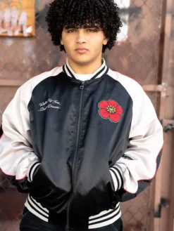 Close-up of MC Abdul It Goes To Eleven Black And White Satin Bomber Jacket