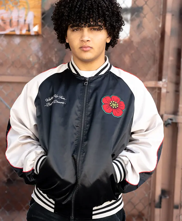 Close-up of MC Abdul It Goes To Eleven Black And White Satin Bomber Jacket