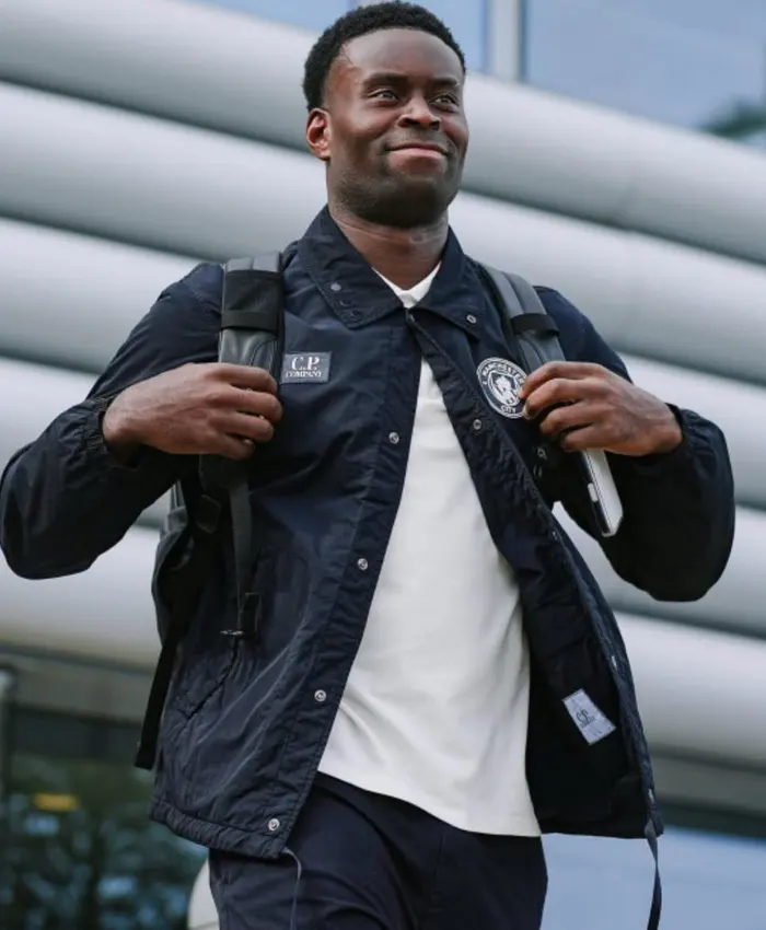 Close-up of Manchester City UEFA Champions League CP Company Black Polyester Track Jacket