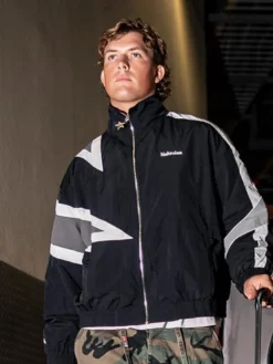 Close-up of NFL New York Giants Jaxson Dart NAHMIAS MVP Black Nylon Bomber Track Jacket