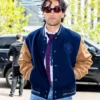 Close-up of New York Fashion Week 2026 Josh Heuston Tommy Hilfiger Navy Blue Wool-Blend Varsity Jacket