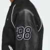Close-up of Skateboarding x Tyshawn Collegiate Crown on the back Lamine Yamal Black Varsity Jacket