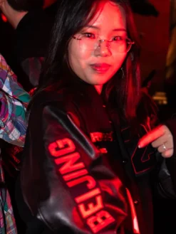 Close-up of Syn Zhuang BEIJING Jordan The One Global Finals Championship Black Varsity Jacket