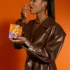 Close-up of WNBA Angel Reese x Reese's Pieces Chocolate Brown Leather Jacket