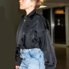 Close view of Florence Pugh New York Airport Black Polyester Cropped Prada Bomber Jacket
