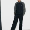 Close view of French Soccer Player Kylian Mbappe Black And Grey On Polyester Tracksuit