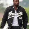 Close view of NFL Atlanta Falcons Bijan Robinson Amiri Distressed-Logo Shrunken Black Cotton Bomber Jacket