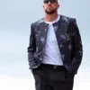 Close view of NFL Kansas City Chiefs Travis Kelce Arrowhead Stadium Louis Vuitton Embellished Collarless Tie-Dye Jacket