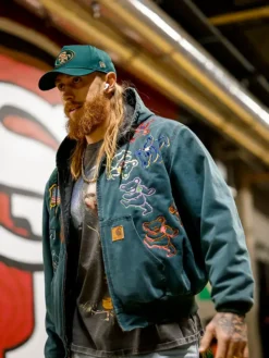 Close view of NFL San Francisco 49ers George Kittle Green Arrival Full-Zip Fleece Hooded Jacket