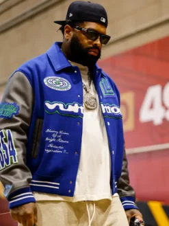 Close view of NFL San Francisco 49ers Trent Williams Louis Vuitton Embroidered Blue And Grey Varsity Jacket