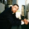 Close view of Travis Kelce Tommy Hilfiger New York City Black Double-Breasted Wool-Blend Peacoat