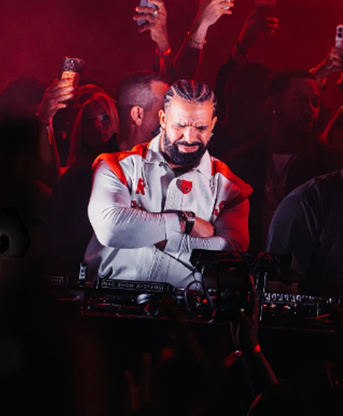 Drake-Surprise-Appearance-at-Taraka-show-Toronto-2026-White-and-Red-Jacket