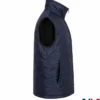 Jason-Schwartzman-Mountainhead-2025-Vest-in-Blue