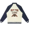 NBA New York Knicks Basketball 2026 Champions Fleece Off-White And Blue Varsity Jacket back view