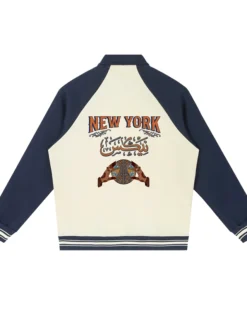 NBA New York Knicks Basketball 2026 Champions Fleece Off-White And Blue Varsity Jacket back view