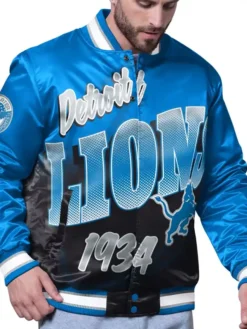 NFL Detroit Lions Starter Pass Rush Full-Snap Blue Satin Varsity Jacket front view