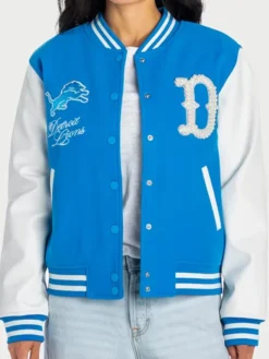 NFL Detroit Lions Women's The Wild Collective Pearl Blue And White Varsity Jacket front view