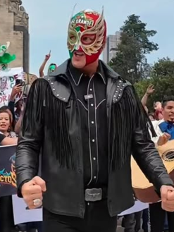 Night-Before-AAA-Mega-Championship-Mexico-City-Crowd-Rally-2026-El-Grande-Americano-Black-Leather-Fringe-Jacket-Front