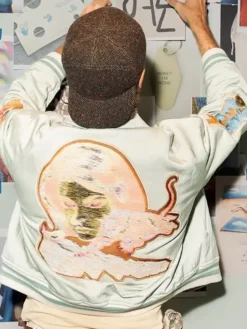 Off-White 10x10 SS27 Milan Fashion Week Stéphane Ashpool Cotton Blue Bird Patches Varsity Jacket back view
