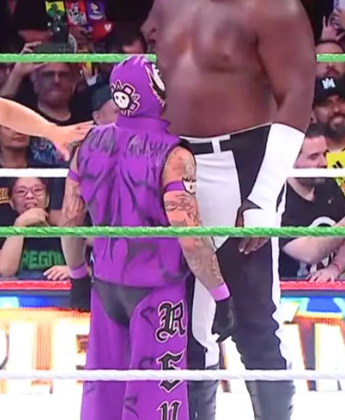 WWE Rey Mysterio AAA TripleMania 34 Halloween 2026 Purple And Black Leather Vest back view