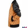 Close-up of Cleopatra Coleman TV-Series Nemesis S01 Ebony Wilder MCM Leather Brown Bomber Jacket