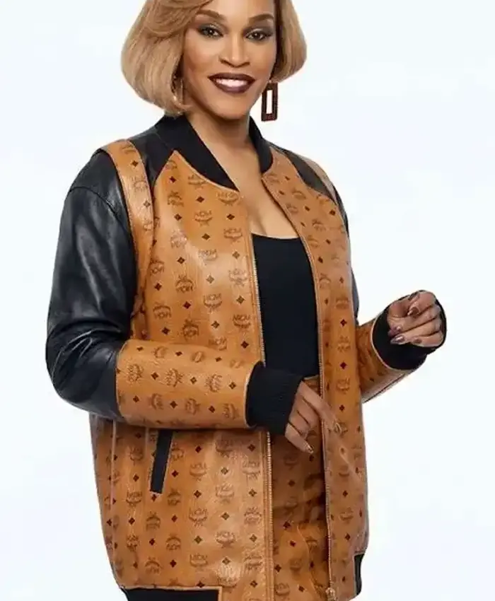 Close-up of Cleopatra Coleman TV-Series Nemesis S01 MCM Ebony Wilder Leather Brown Bomber Jacket