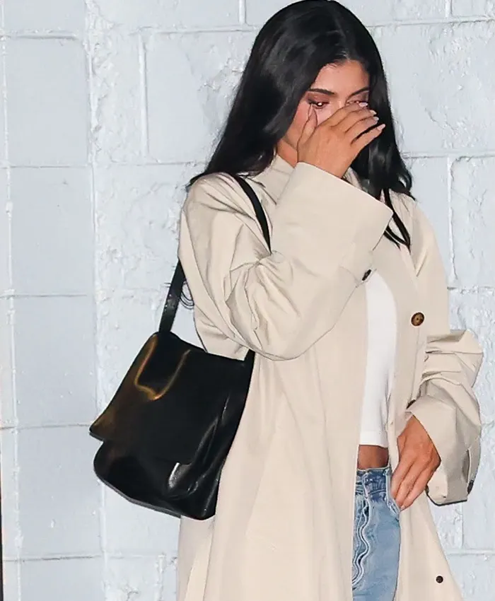 Close-up of Kylie Jenner Celeb Hotspot Sushi Park 2026 WeHo Beige Cotton Trench Coat