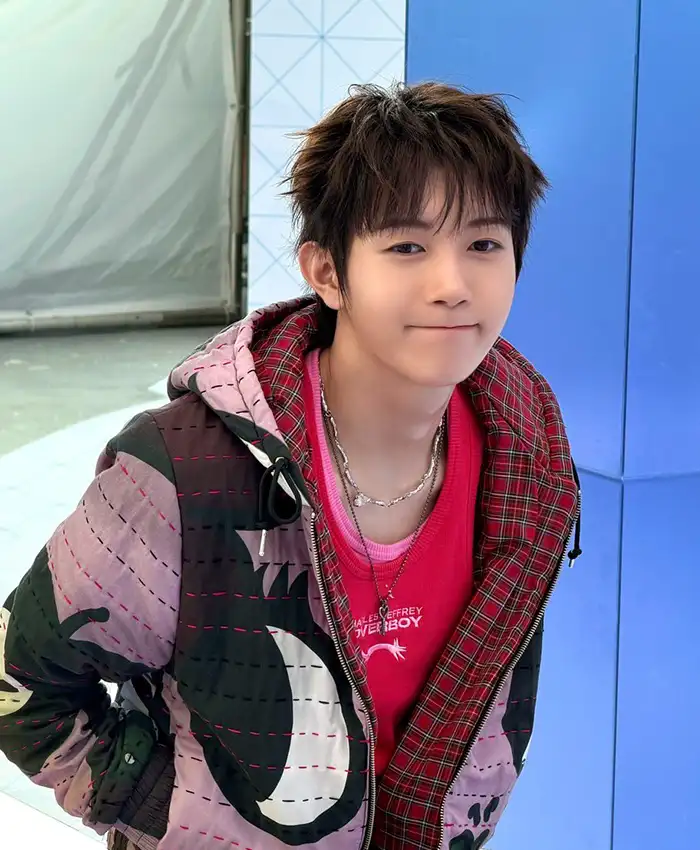 Close-up of NCT Wish I Spy Music Video Fujinaga Sakuya Chopova Lowena Lucky Lady Hooded Puffer Jacket